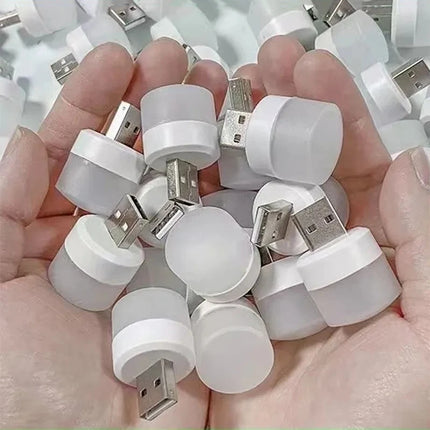 Mini USB plug-in night light in warm or white light